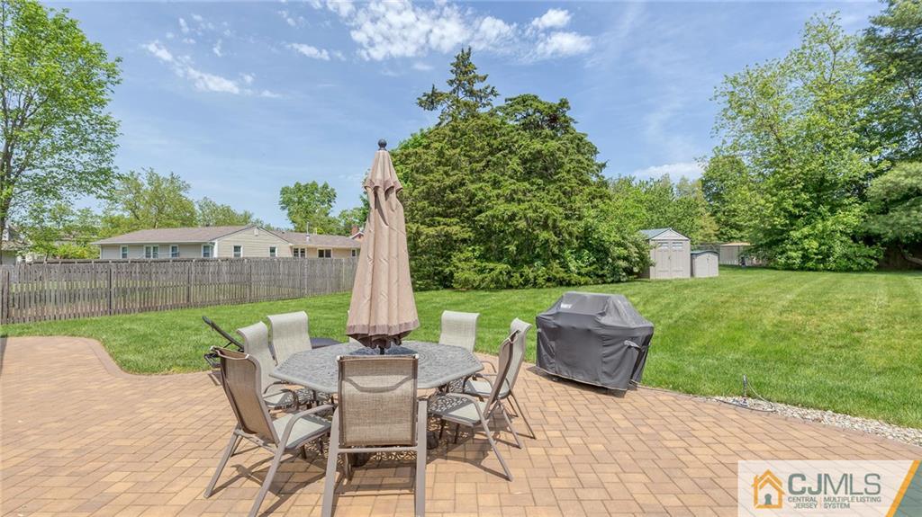 23 Johnson Road Somerset, NJ 08873 - Photo 4 of 12 a view of yard with furniture and garden