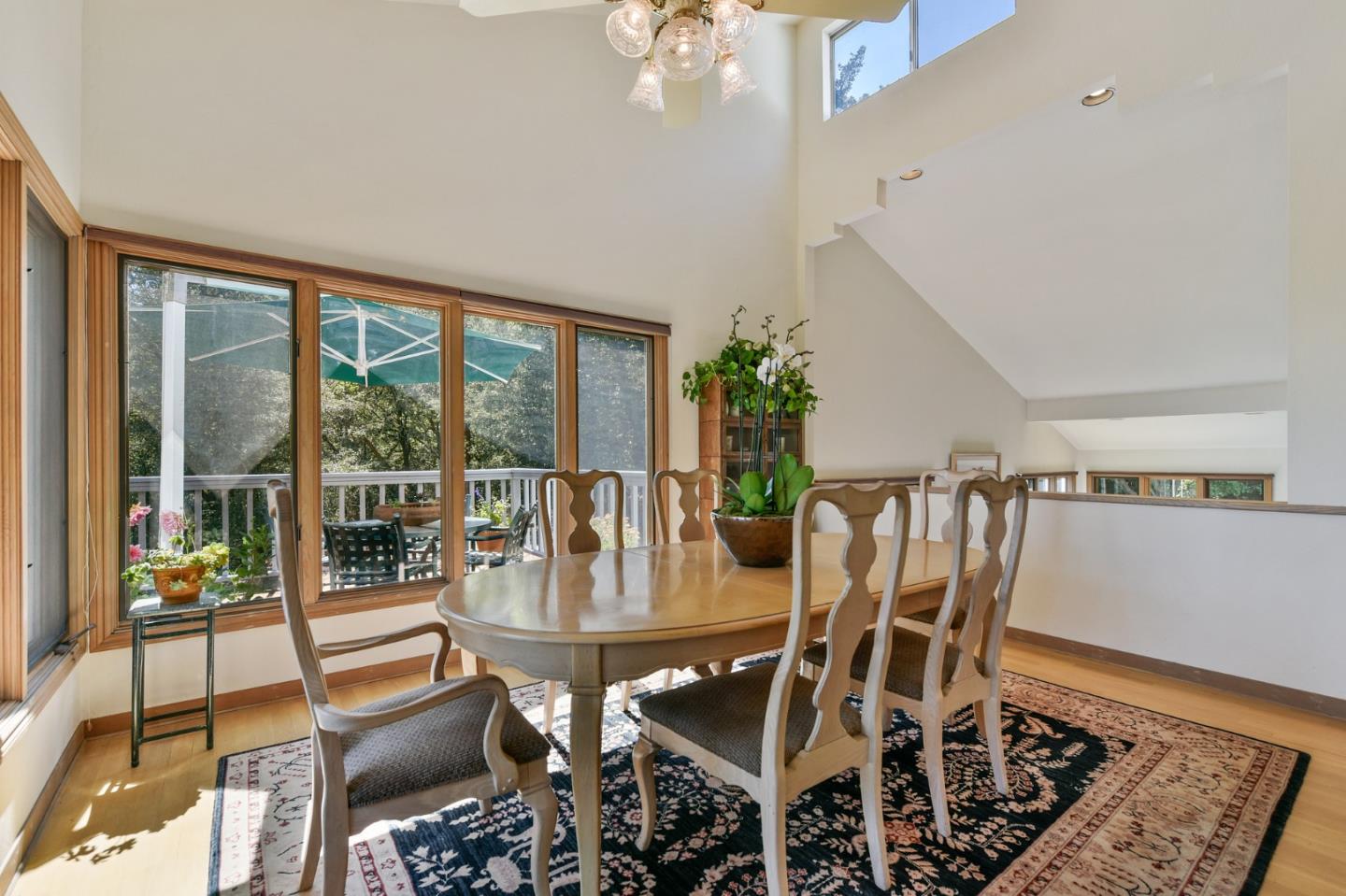255 Allen Road Woodside, CA 94062 - Photo 16 of 43 a view of a dining room with furniture window and outside view