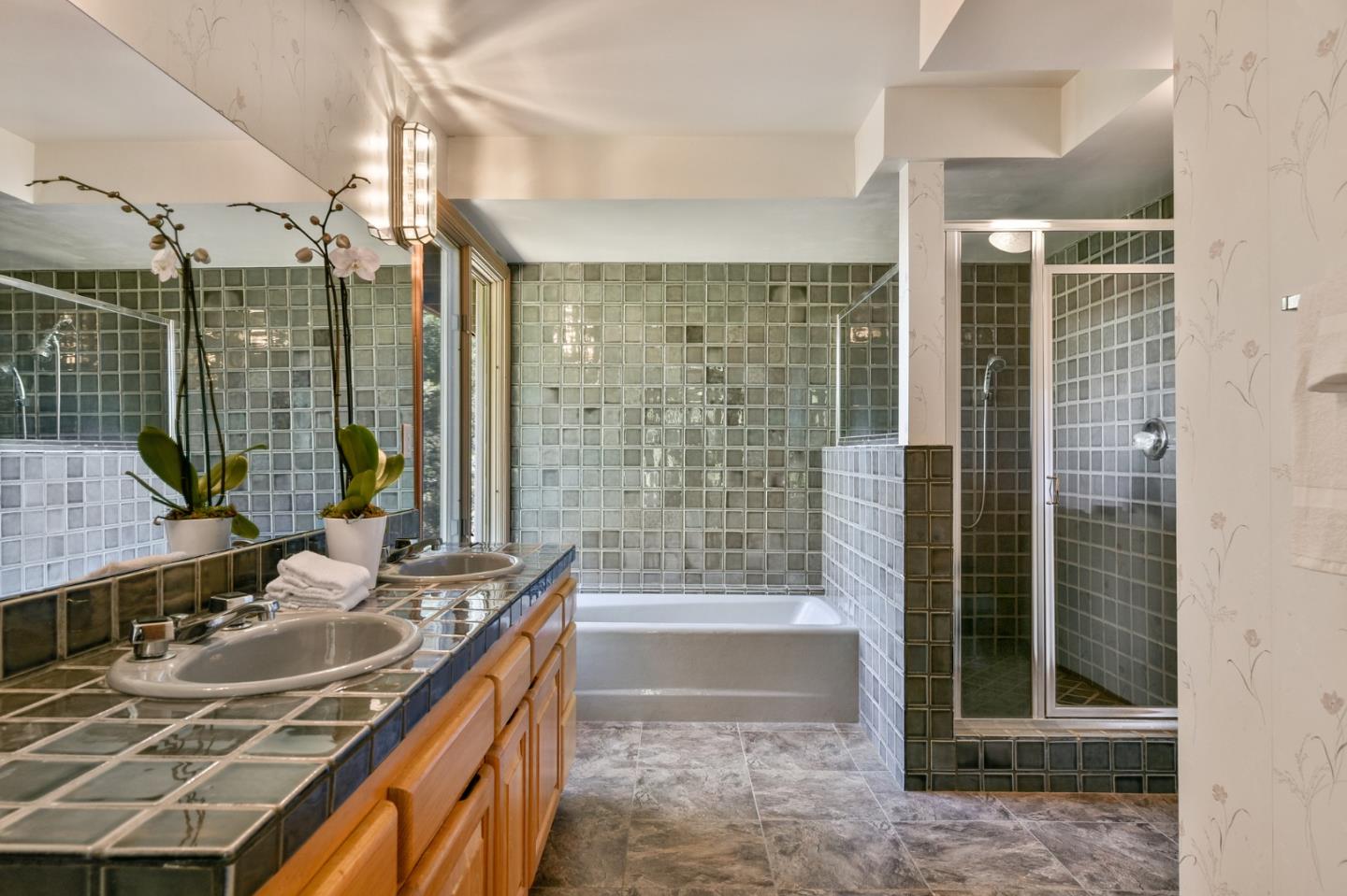 255 Allen Road Woodside, CA 94062 - Photo 20 of 43 a bathroom with a granite countertop sink a toilet and shower