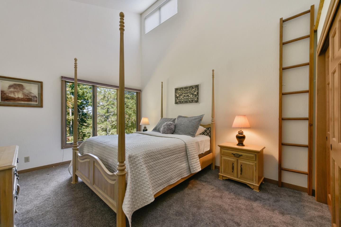 255 Allen Road Woodside, CA 94062 - Photo 23 of 43 a bed room with a bed and a window