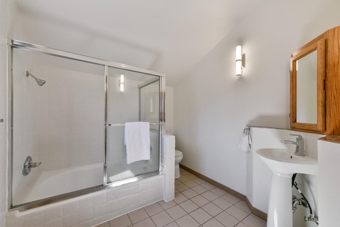 255 Allen Road Woodside, CA 94062 - Photo 26 of 43 a bathroom with a shower and a sink