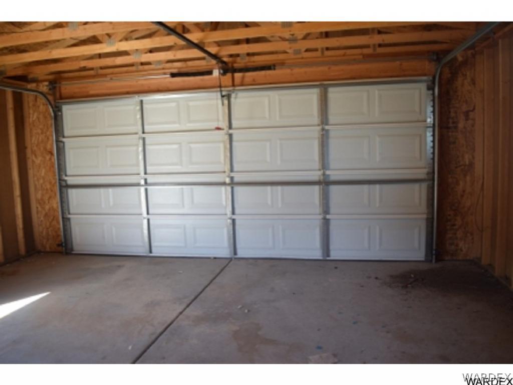5807 Davis Road Golden Valley, AZ 86413 - Photo 16 of 17 a view of a small room with racks on the wall