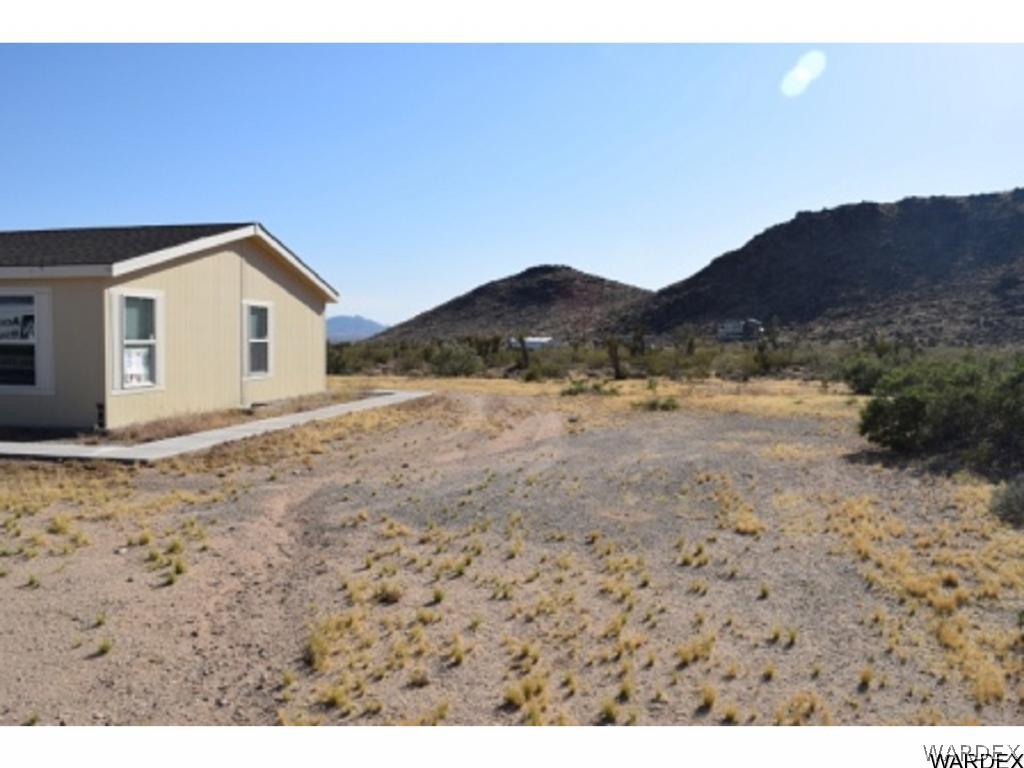 5807 Davis Road Golden Valley, AZ 86413 - Photo 3 of 17 a view of an house with a yard