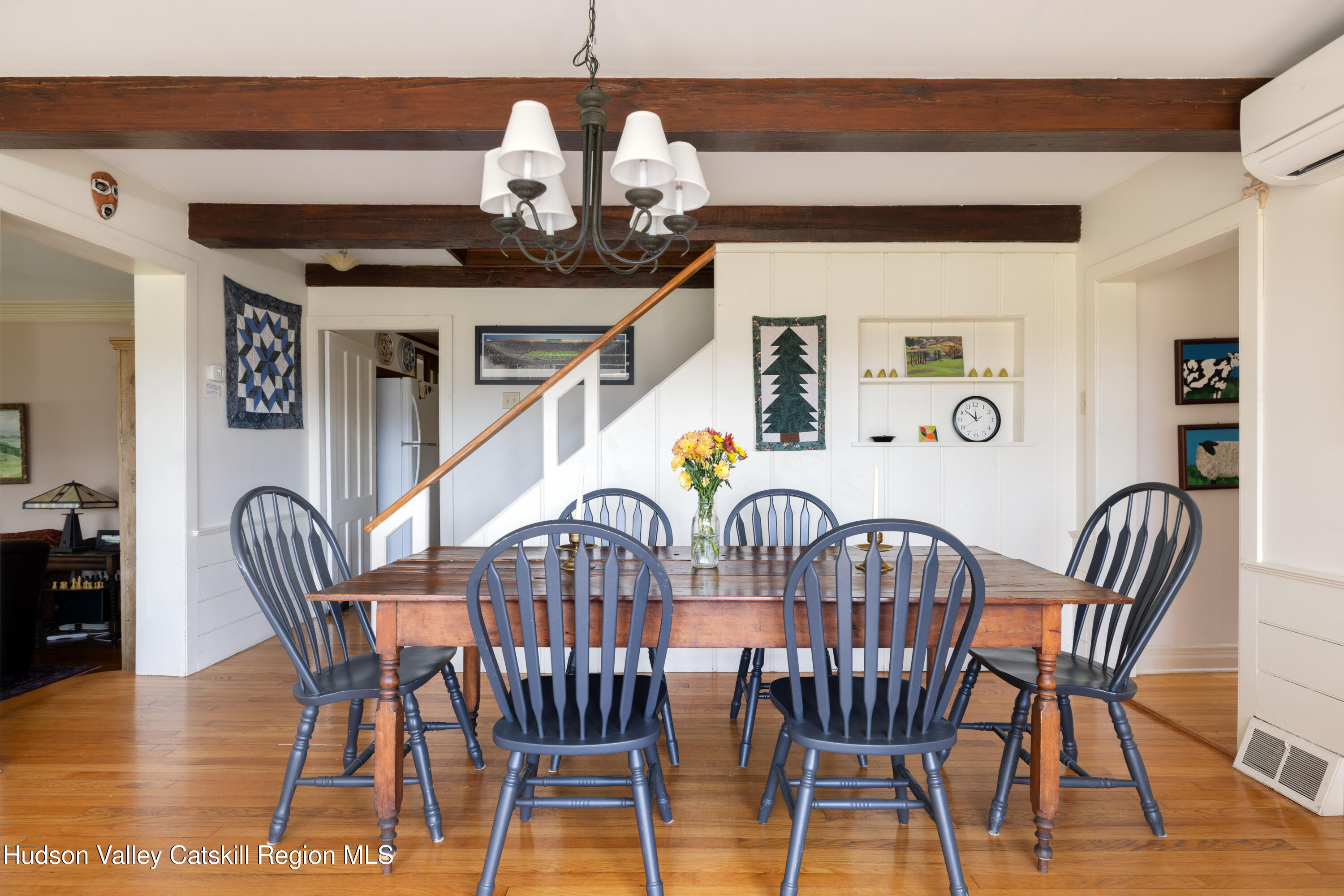 76 Smith Road Preston Hollow, NY 12469 - Photo 11 of 51 a view of a dining room with furniture wooden floor and chandelier