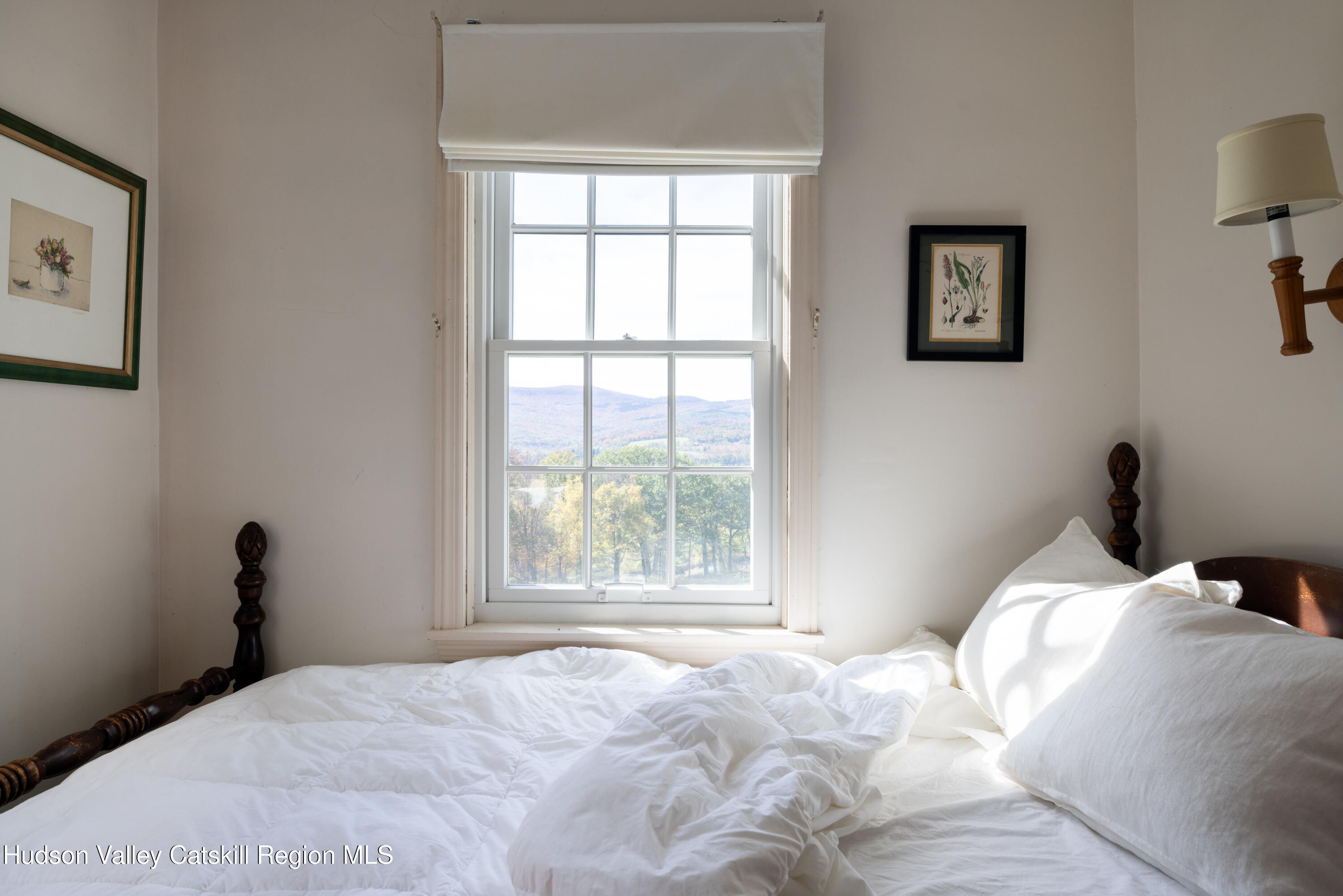 76 Smith Road Preston Hollow, NY 12469 - Photo 13 of 51 a bedroom with a bed and a window