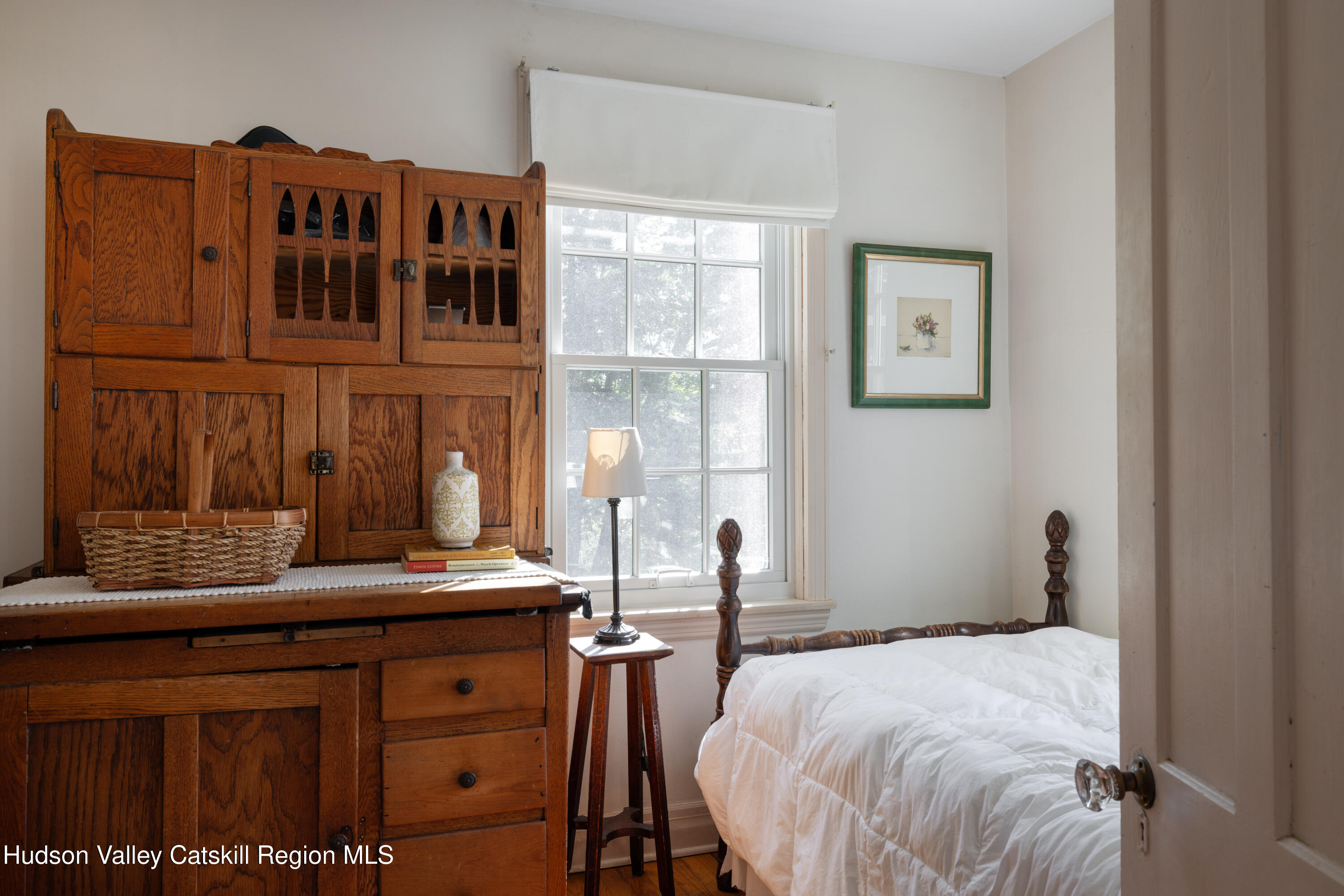 76 Smith Road Preston Hollow, NY 12469 - Photo 14 of 51 a bedroom with a bed and a window