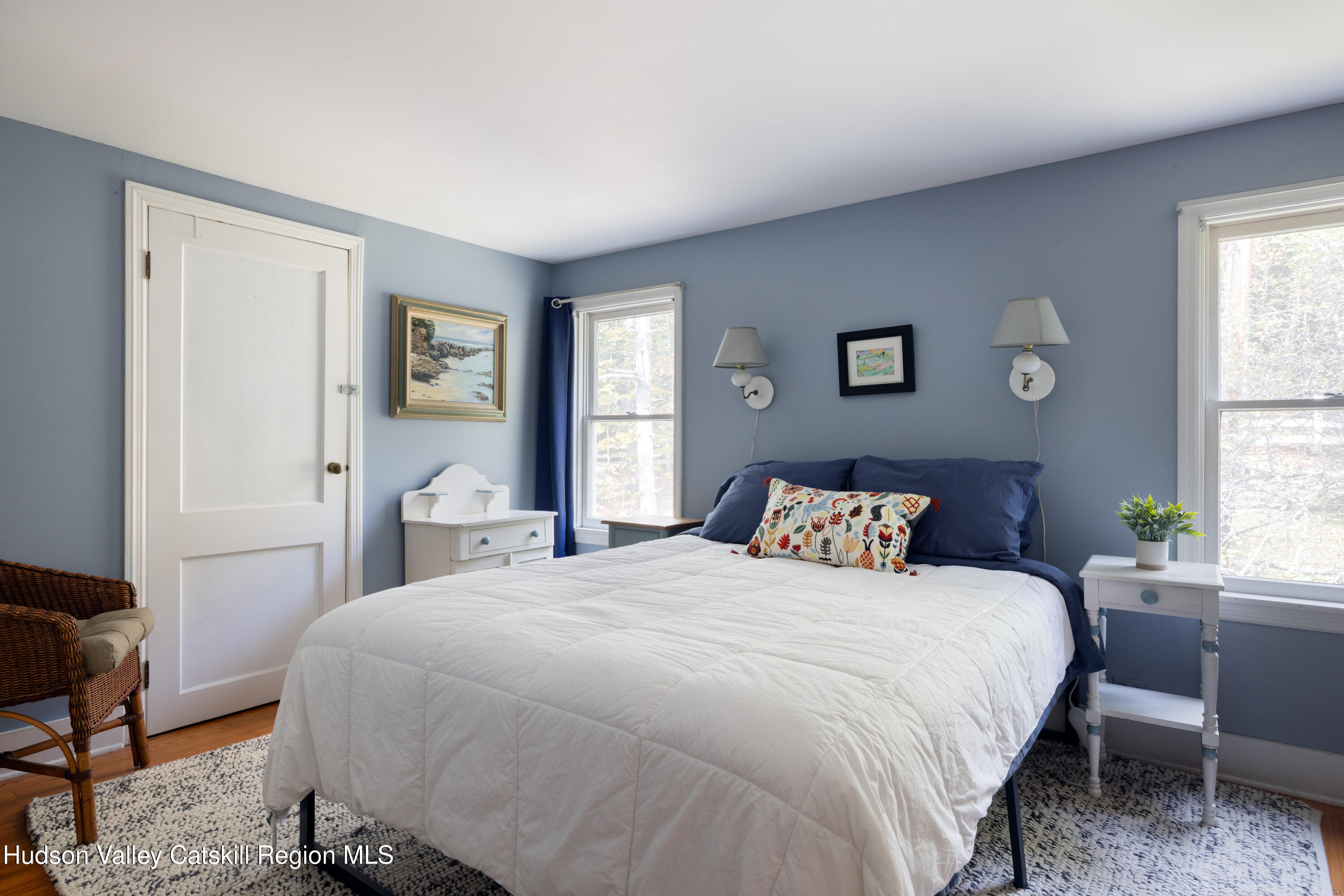 76 Smith Road Preston Hollow, NY 12469 - Photo 19 of 51 a bedroom with a bed and a window