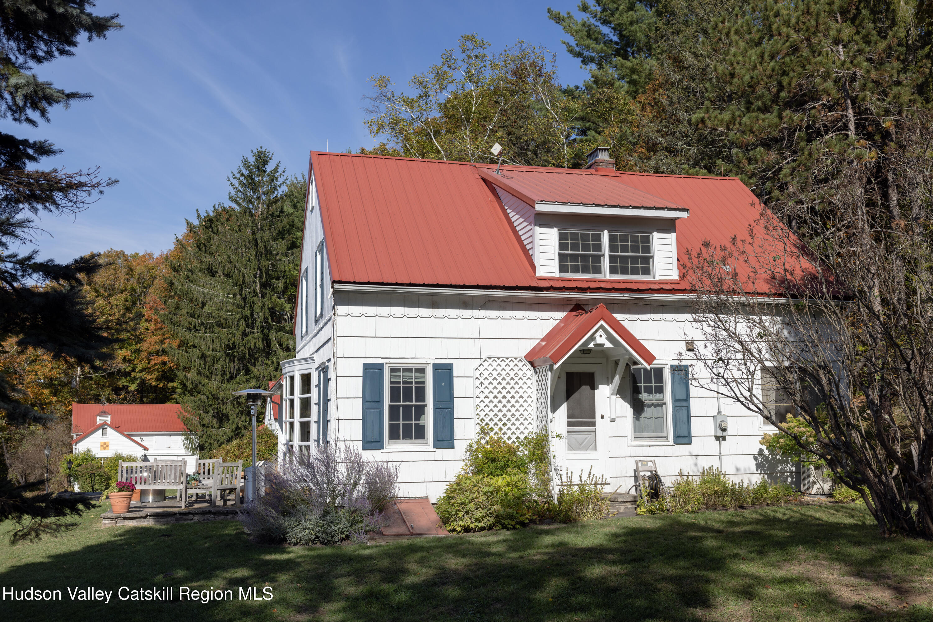 76 Smith Road Preston Hollow, NY 12469 - Photo 25 of 51 a front view of a house with a yard and garage