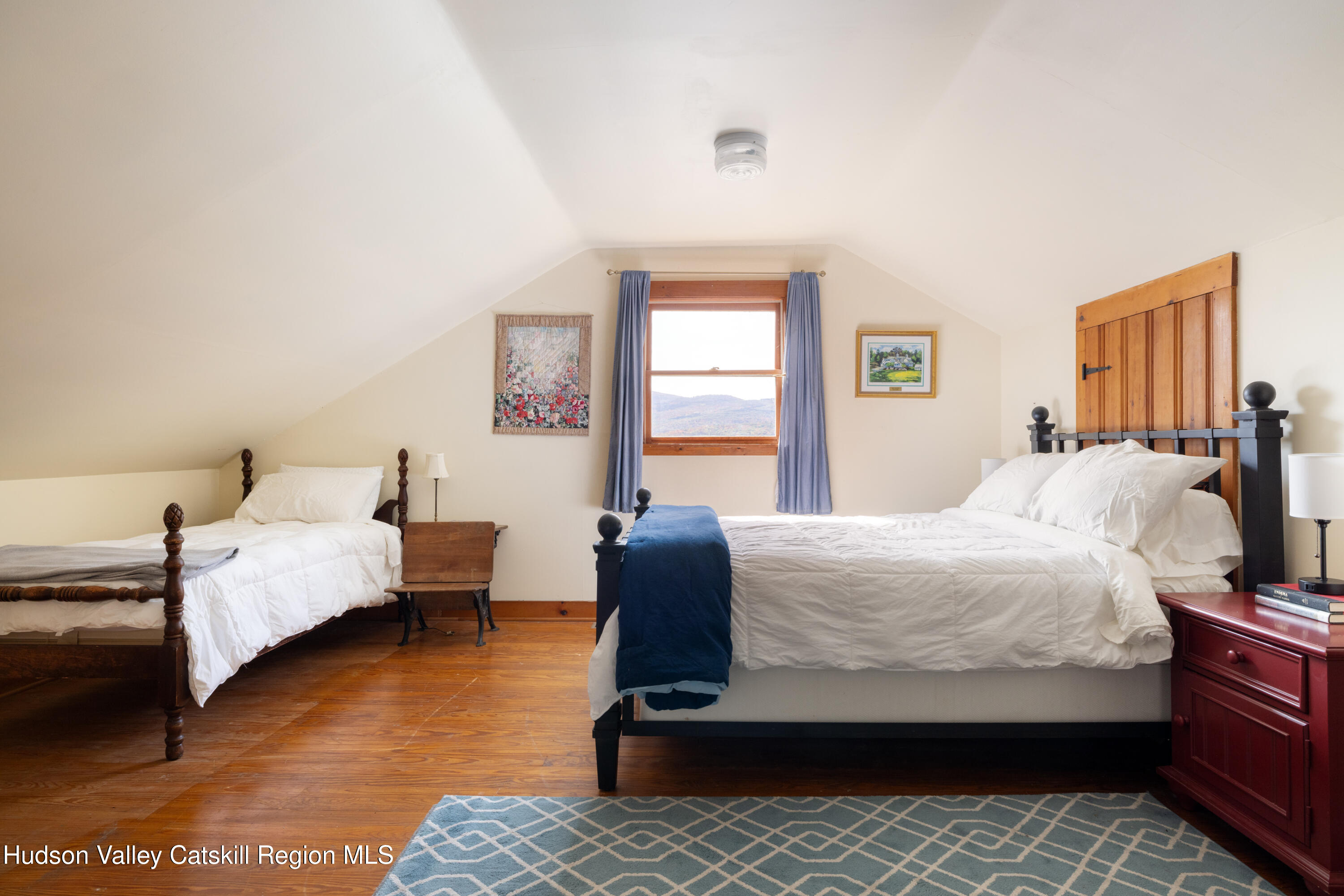 76 Smith Road Preston Hollow, NY 12469 - Photo 31 of 51 a bedroom with a bed and window