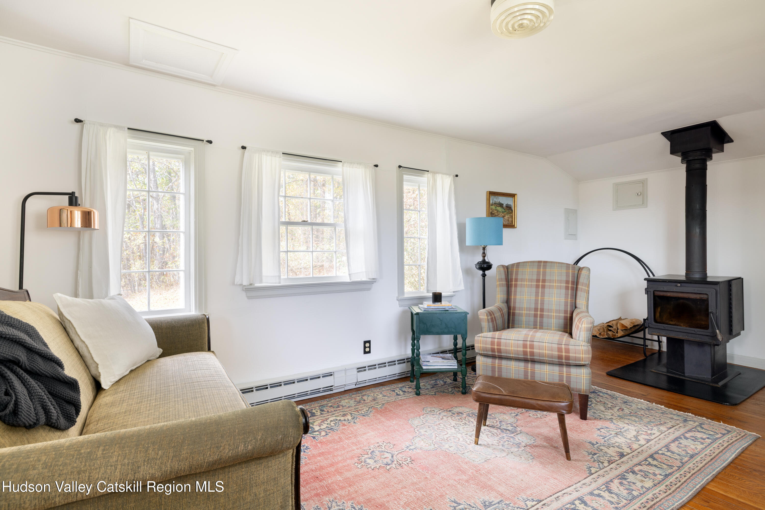 76 Smith Road Preston Hollow, NY 12469 - Photo 38 of 51 a living room with furniture and a window