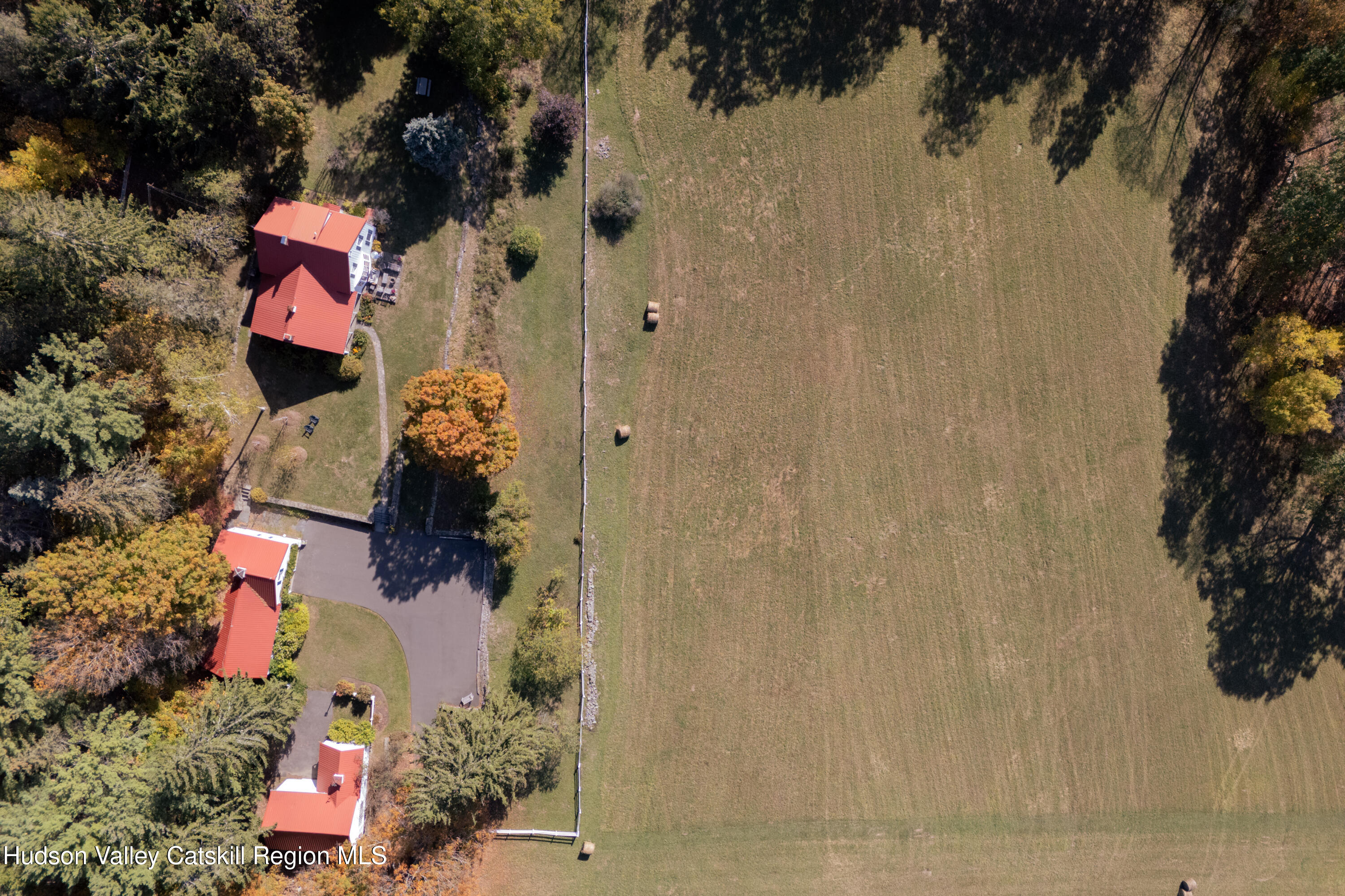 76 Smith Road Preston Hollow, NY 12469 - Photo 44 of 51 an aerial view of a house with a yard and trees