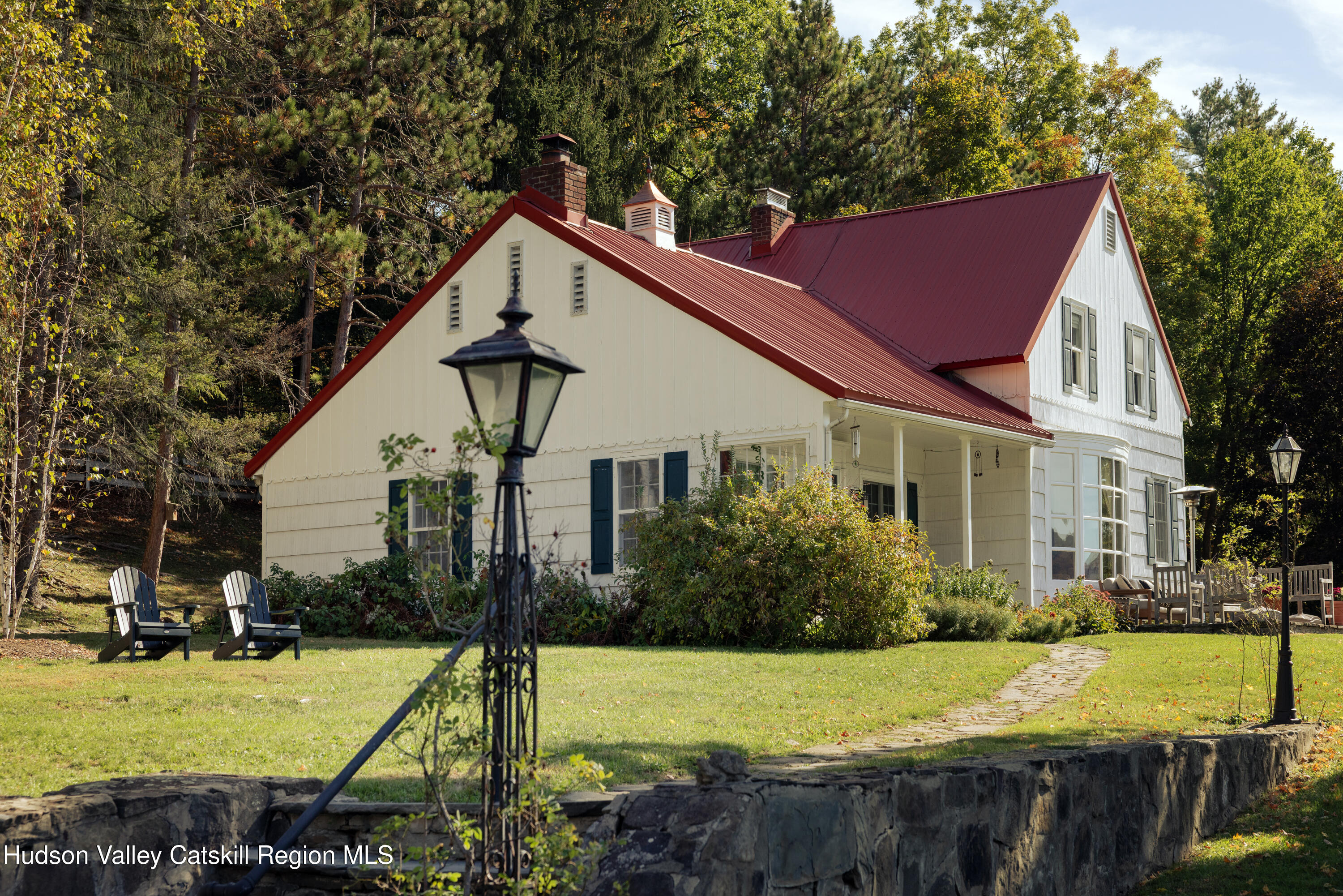 76 Smith Road Preston Hollow, NY 12469 - Photo 8 of 51 a view of a house with backyard and trees