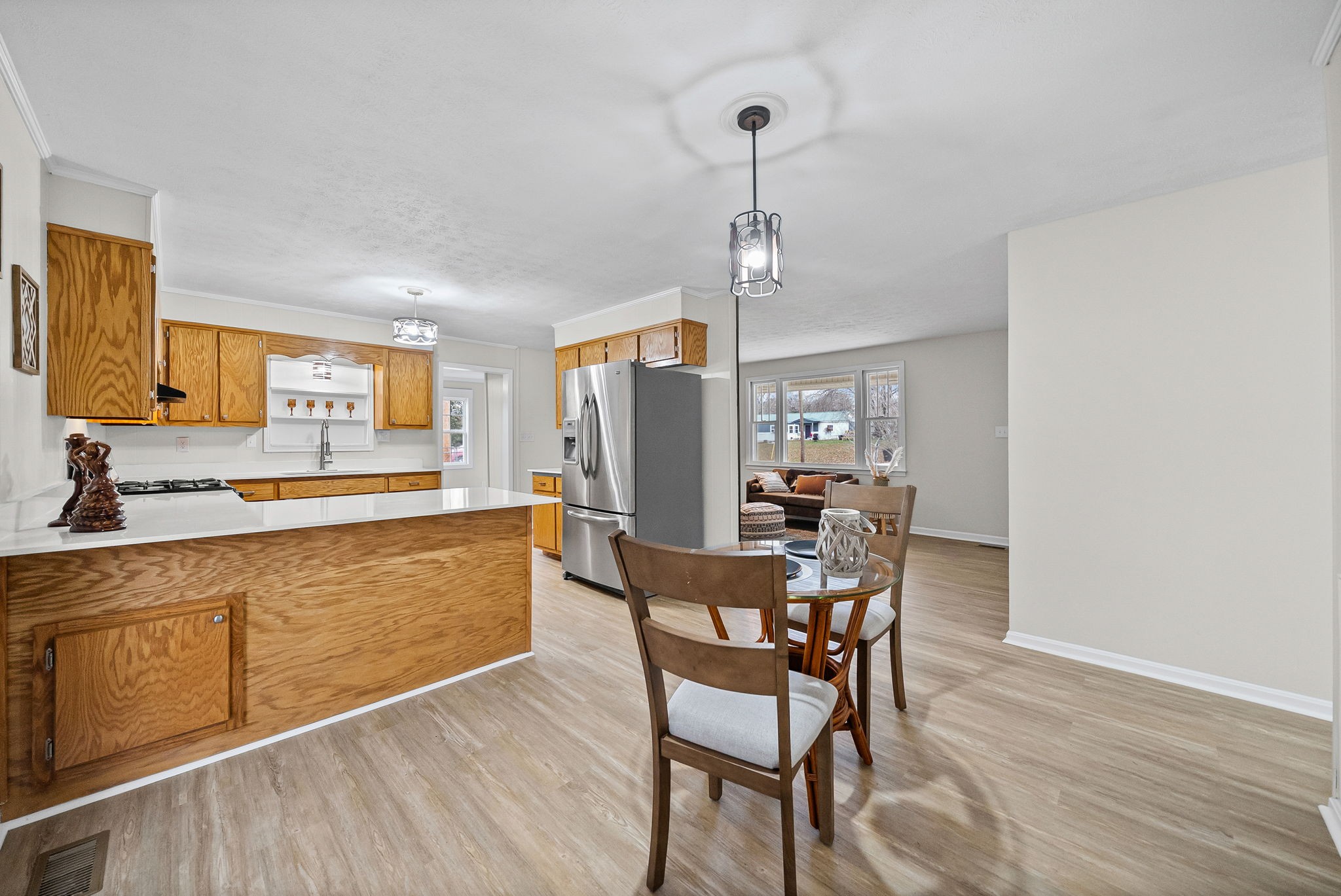 a view of a kitchen and dining room