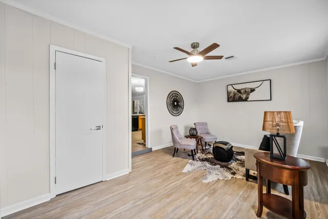 a bathroom with a toilet sink and a window