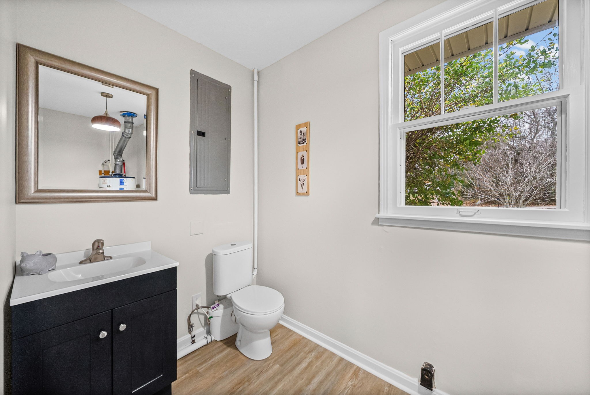 1272 Taylortown Road White Bluff, TN 37187 - Photo 17 of 39 a bathroom with a toilet sink and a window