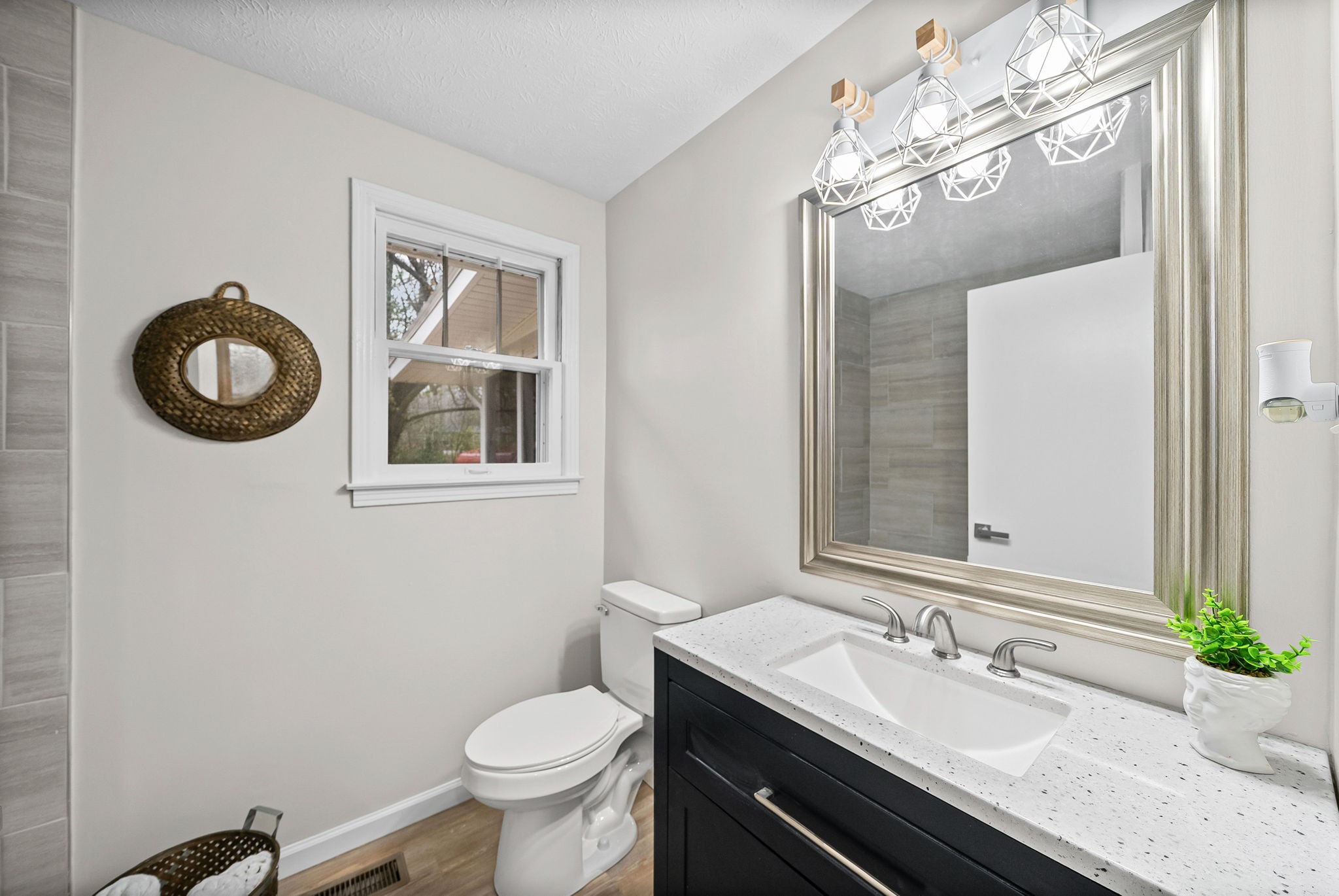 1272 Taylortown Road White Bluff, TN 37187 - Photo 21 of 39 a bathroom with a granite countertop toilet sink and mirror