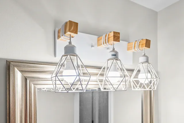 a bathroom with a shower and a sink