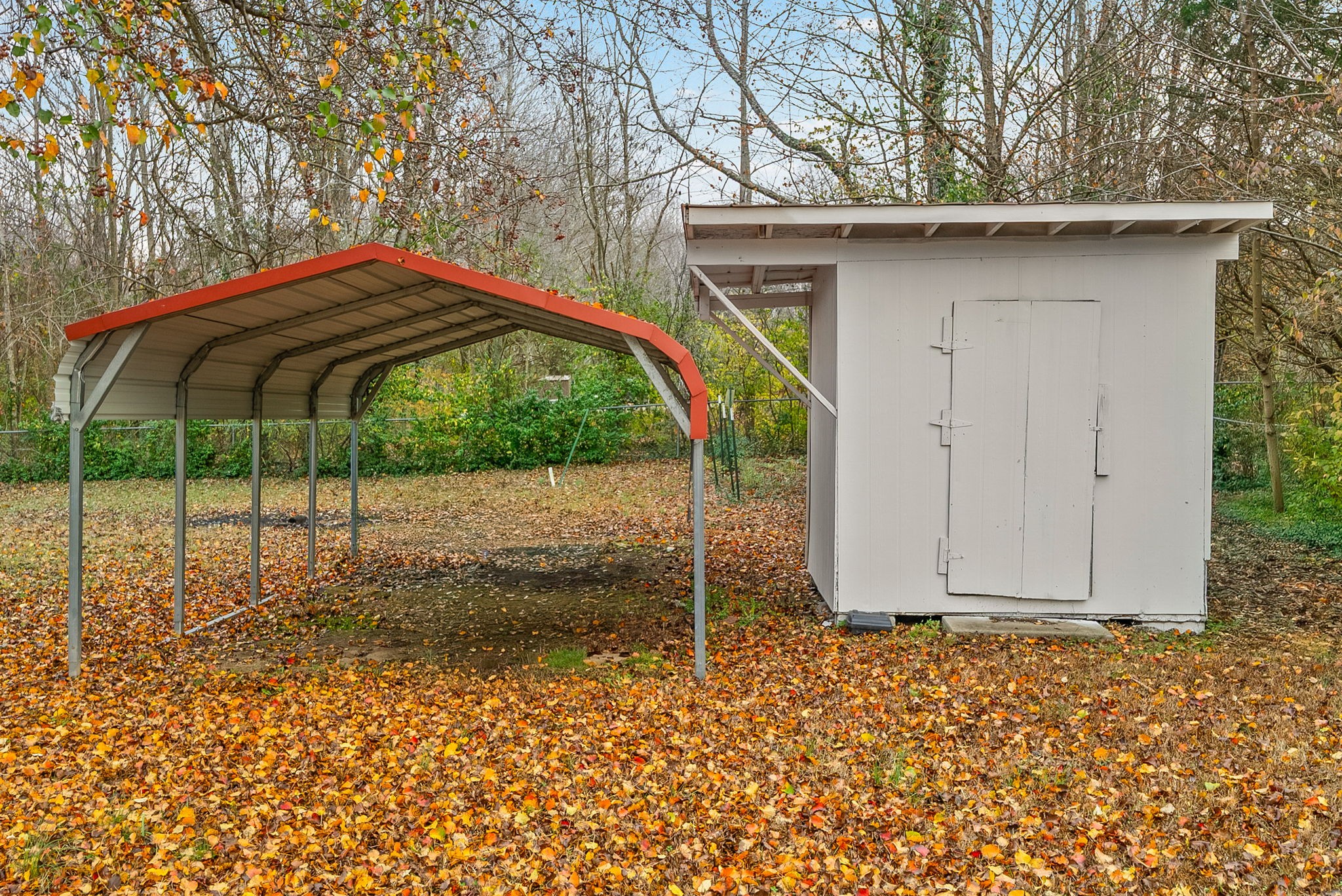 1272 Taylortown Road White Bluff, TN 37187 - Photo 33 of 39 a backyard of a house with table and chairs