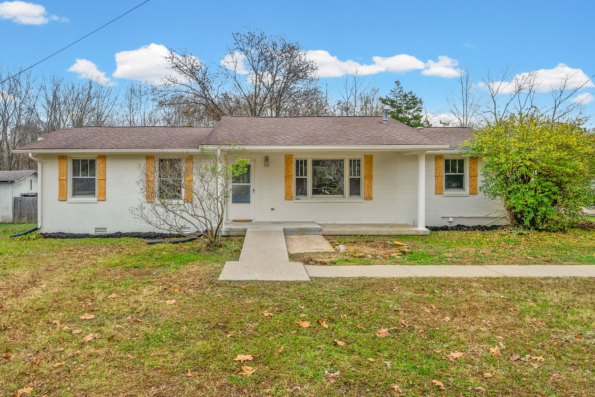 1272 Taylortown Road White Bluff, TN 37187 - Photo 4 of 39 a front view of a house with garden