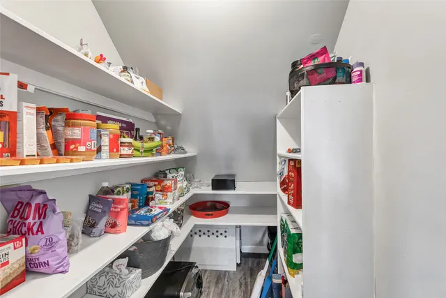 a room with storage and utility