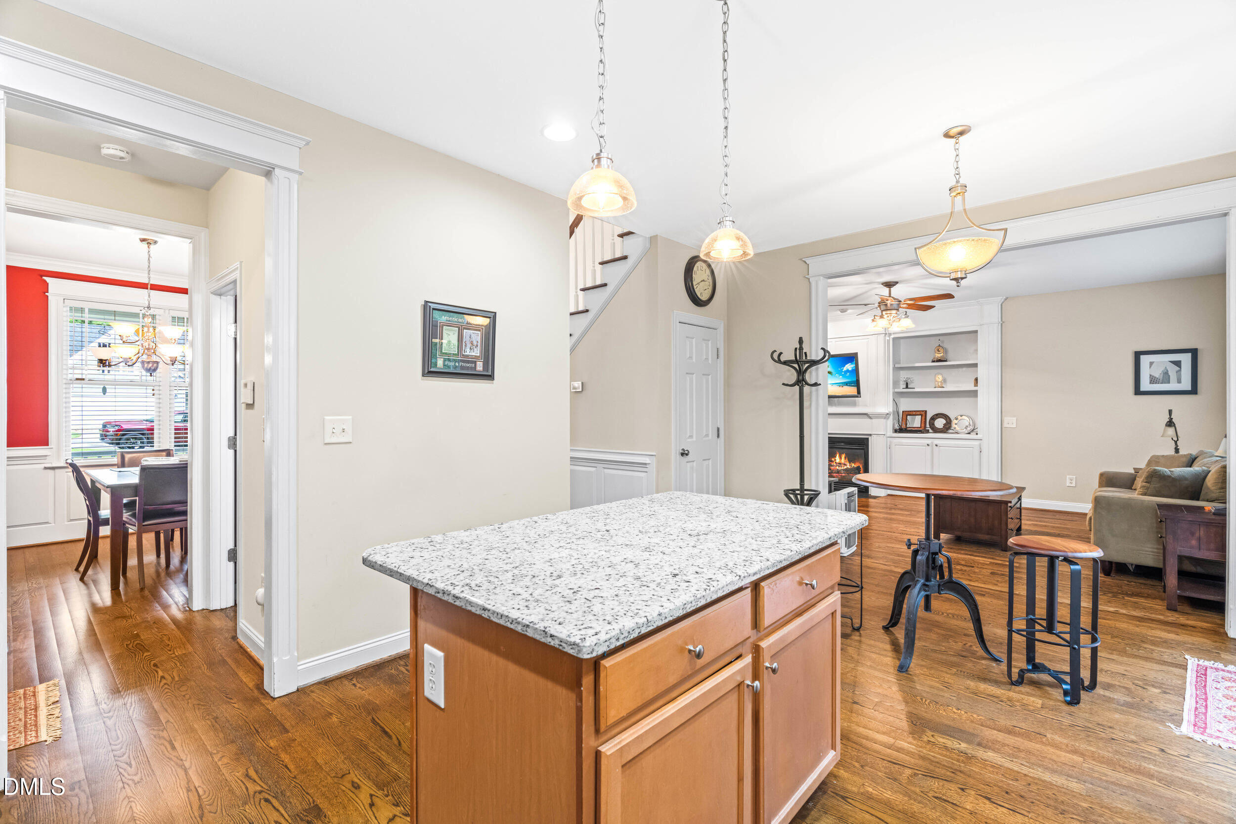 126 Geranium Way Clayton, NC 27527 - Photo 14 of 35 a kitchen with a table and chairs in it