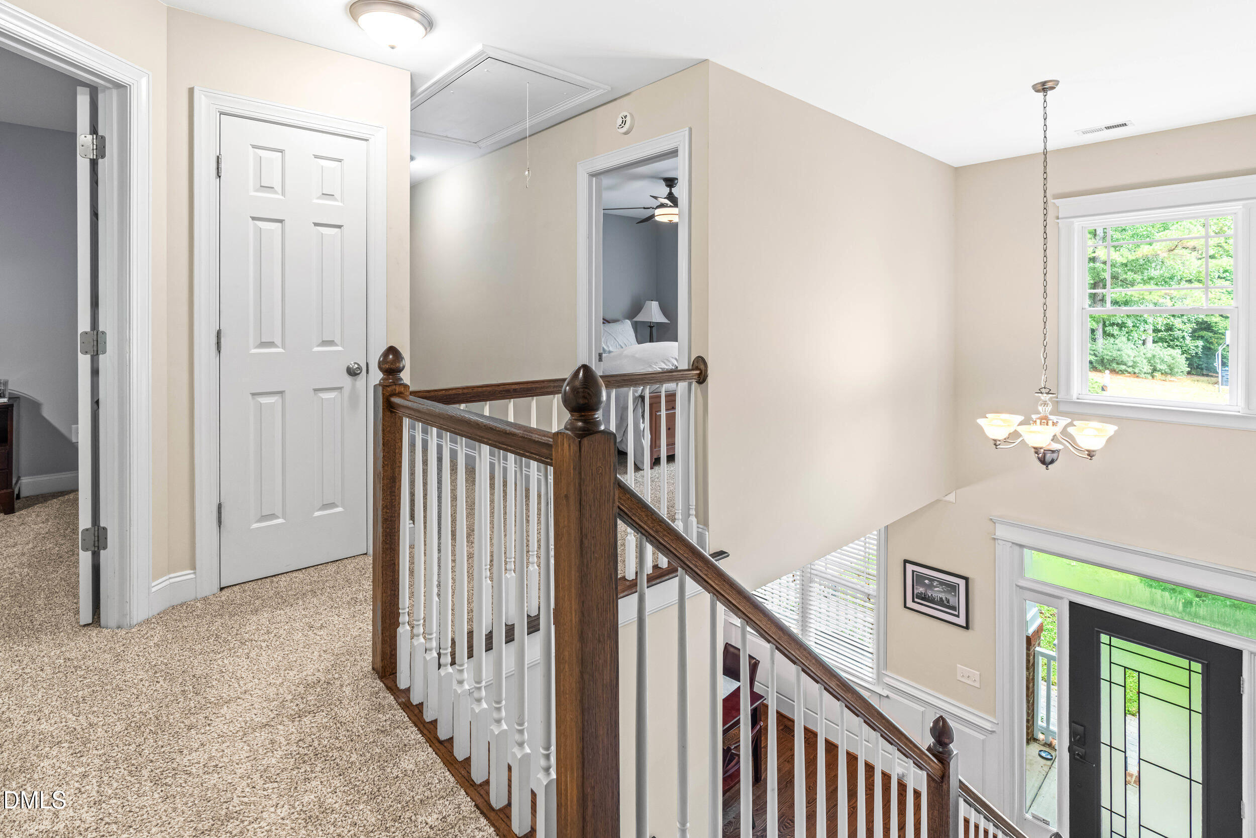 126 Geranium Way Clayton, NC 27527 - Photo 18 of 35 a view of an entryway with wooden floor