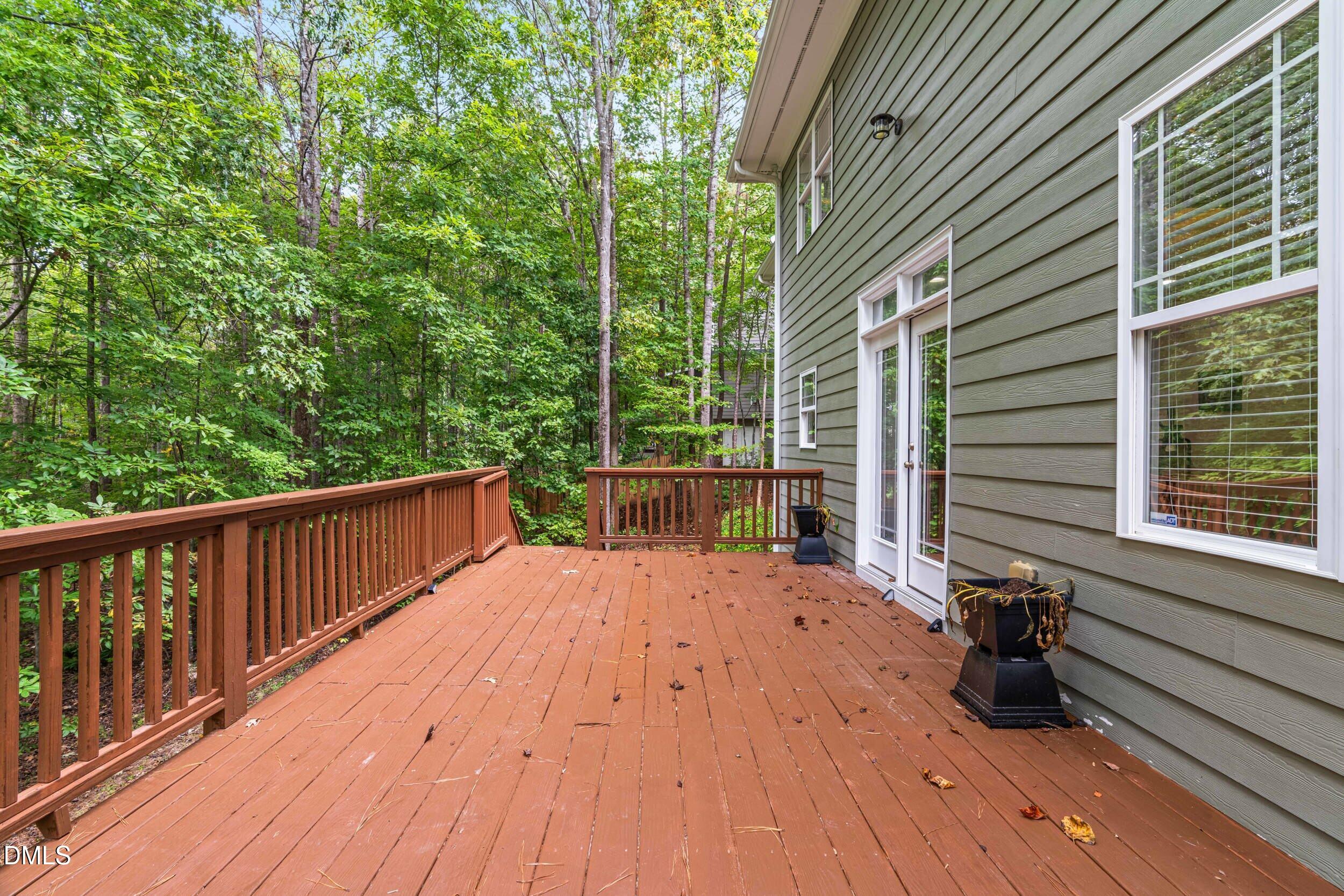 126 Geranium Way Clayton, NC 27527 - Photo 29 of 35 a view of balcony with wooden floor and outdoor space