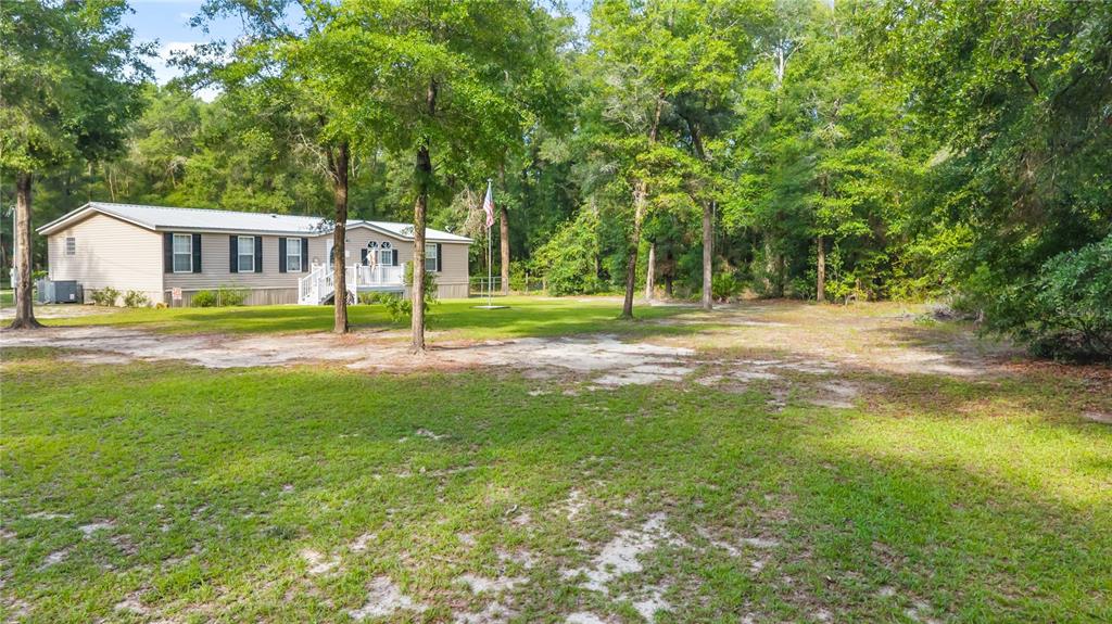6679 Northwest 27th Place Bell, FL 32619 - Photo 2 of 55