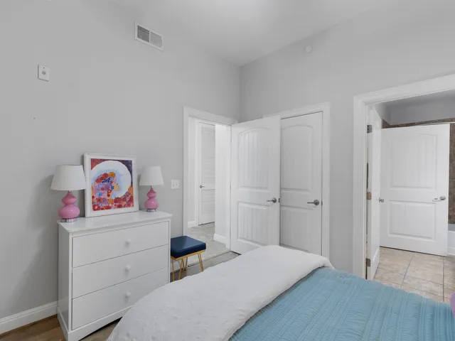 a room with a bed and a closet