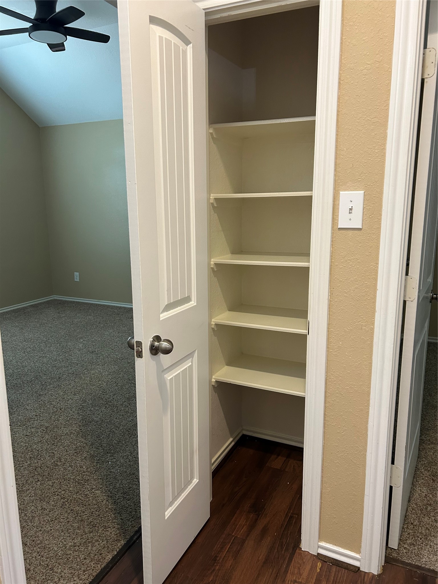 25111 Country Gate Drive Tomball, TX 77375 - Photo 12 of 22 a view of walk in closet with empty racks