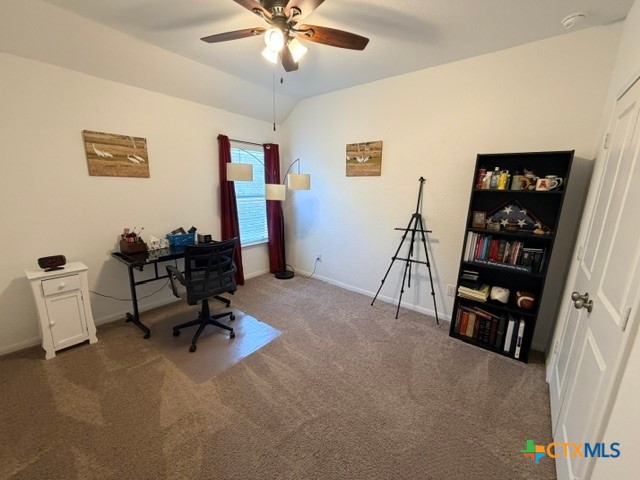 8942 Rancher Place Seguin, TX 78155 - Photo 35 of 48 a view of a livingroom with workspace and a couch