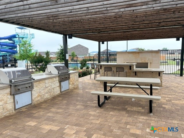 8942 Rancher Place Seguin, TX 78155 - Photo 46 of 48 a view of a chairs and table in the patio