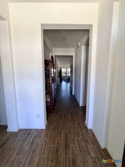 8942 Rancher Place Seguin, TX 78155 - Photo 5 of 48 a view of a hallway view with wooden floor and staircase