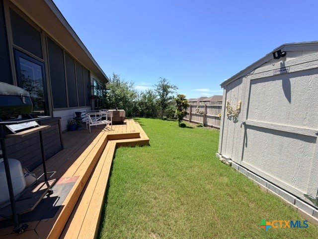 8942 Rancher Place Seguin, TX 78155 - Photo 9 of 48 a view of a backyard with furniture
