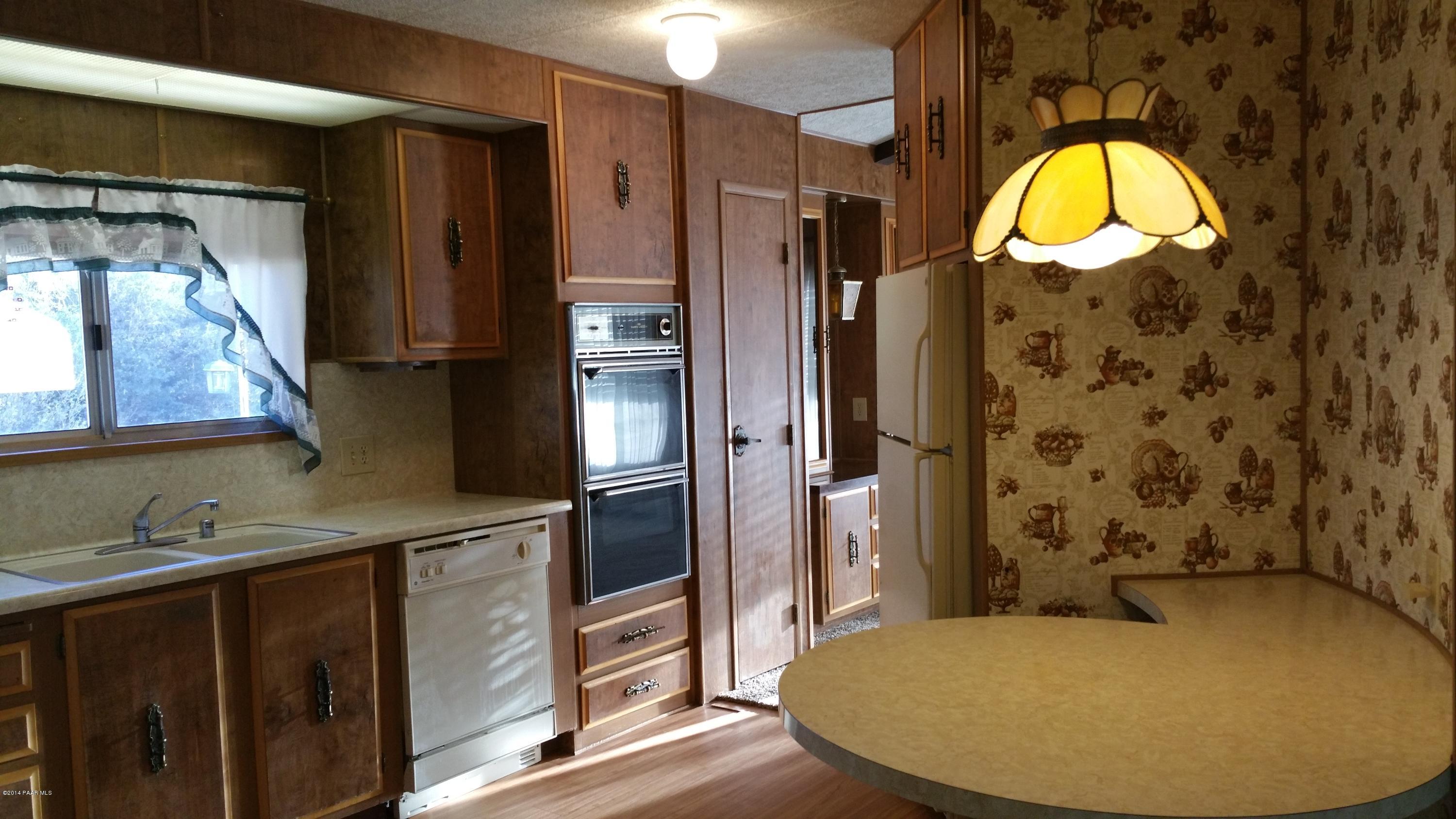 10255 East Durham Road, Unit PCC Dewey, AZ 86327 - Photo 7 of 20 Kitchen with builtin nook, pantry, dbl o