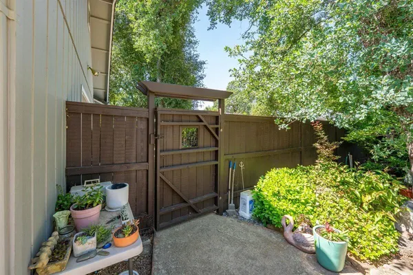 a backyard of a house with lots of green space