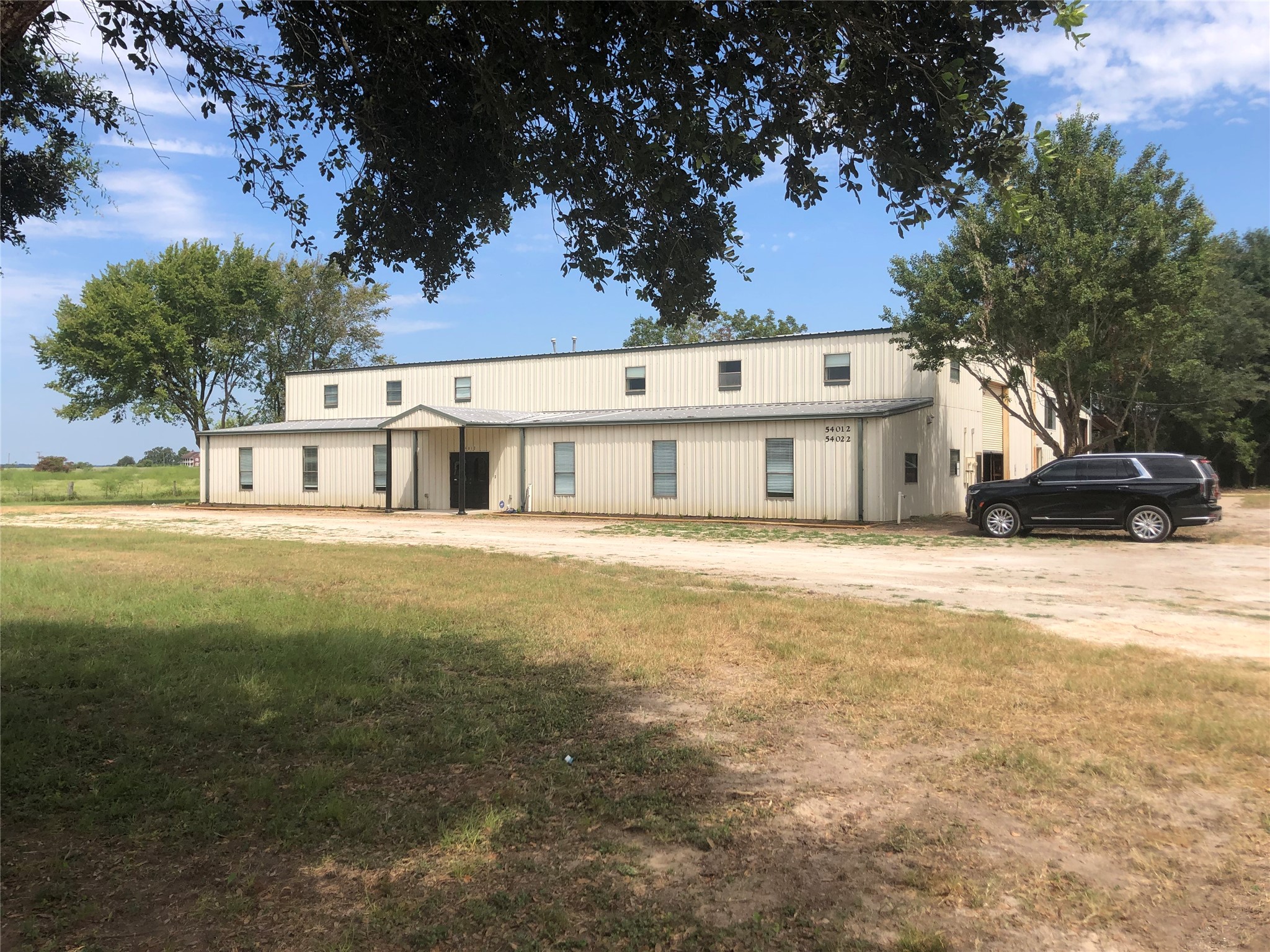 54012 Highway 290 East Hempstead, TX 77445 - Photo 2 of 21 a front view of a house with a yard