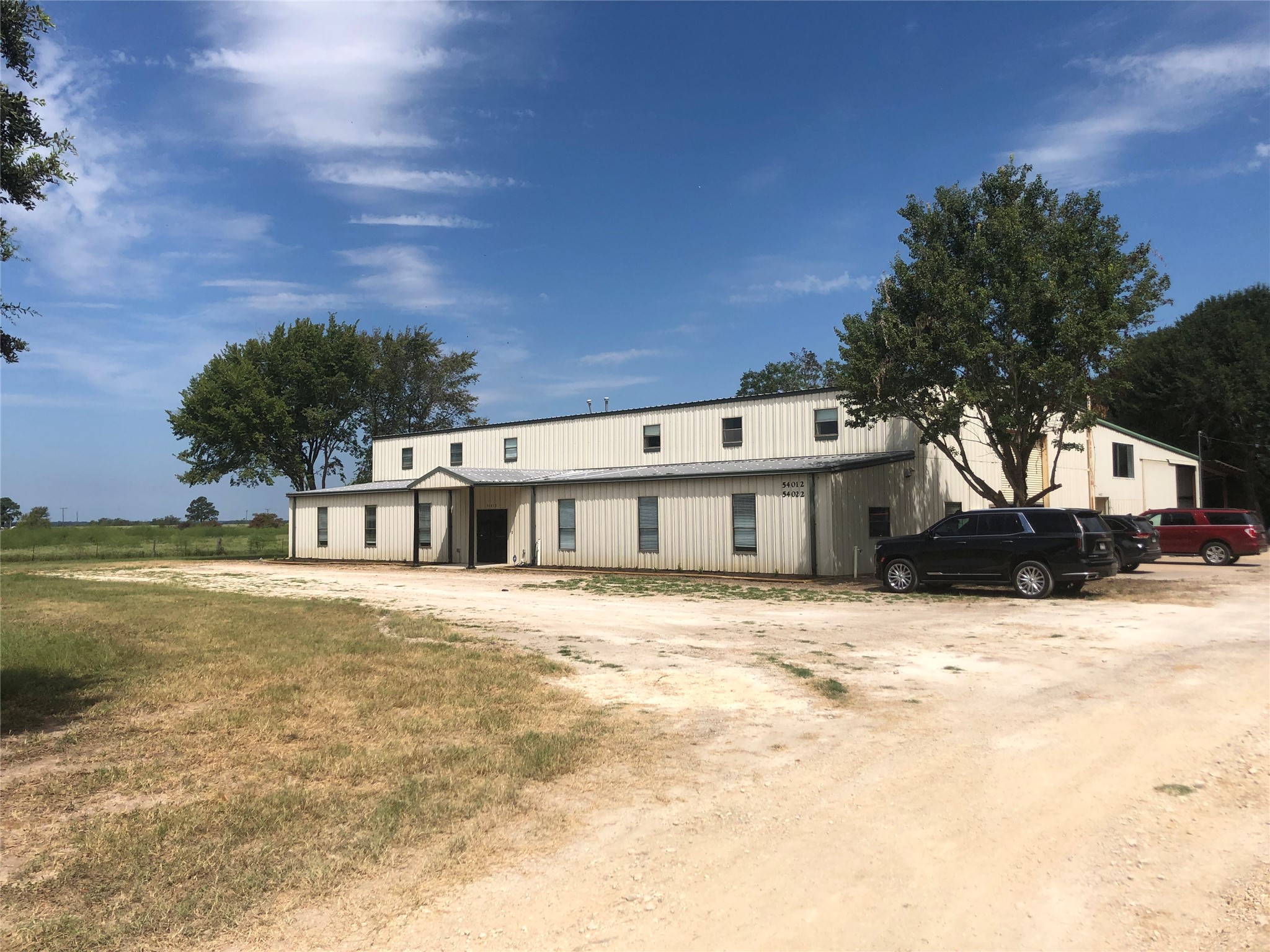 54012 Highway 290 East Hempstead, TX 77445 - Photo 3 of 21 a front view of a house with a yard