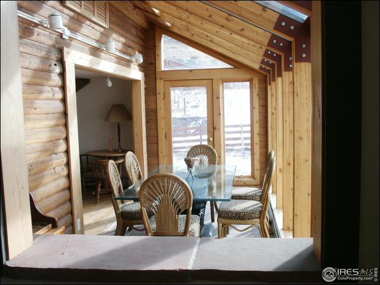 438 Red Gulch Road Lyons, CO 80540 - Photo 5 of 6 Sunroom