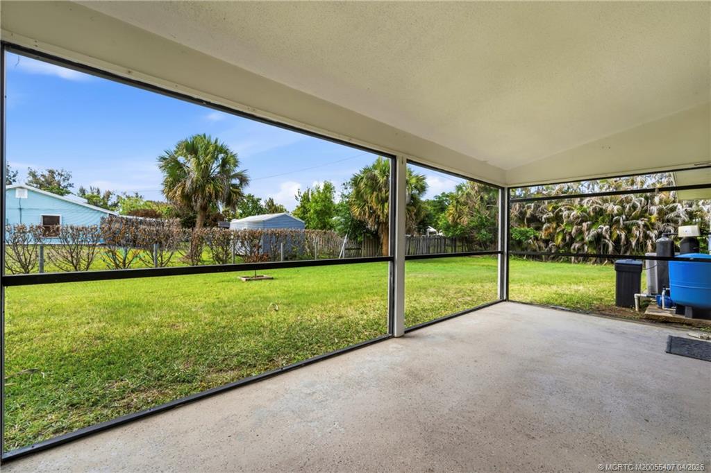 6285 Southeast Highland Avenue Stuart, FL 34997 - Photo 21 of 24 a view of a garden with an outdoor space