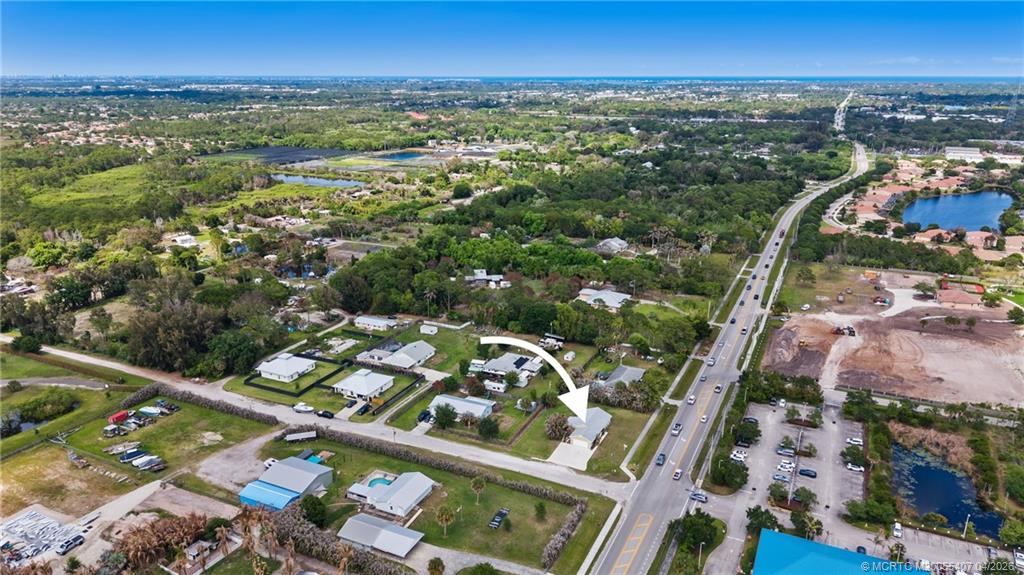 6285 Southeast Highland Avenue Stuart, FL 34997 - Photo 23 of 24 view of city with balcony