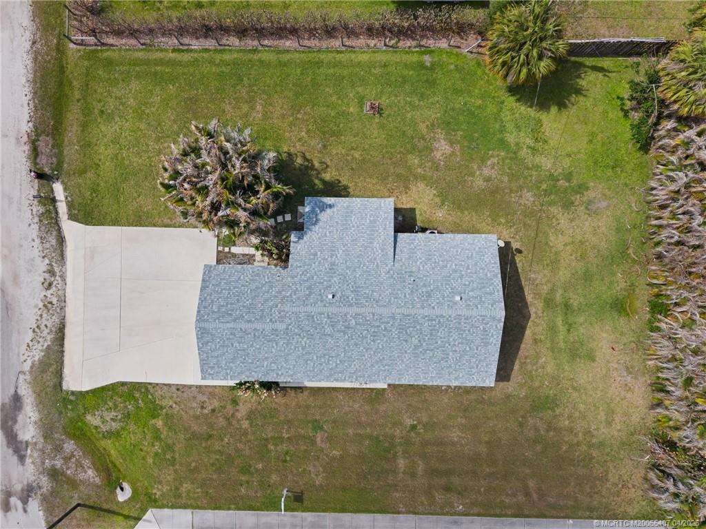 6285 Southeast Highland Avenue Stuart, FL 34997 - Photo 6 of 24 a view of a lake from a balcony