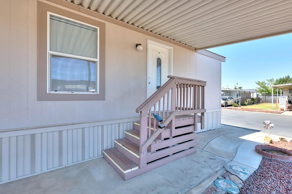 3506 Homestead Way Ceres, CA 95307 - Photo 7 of 39 a view of entryway livingroom and hall with wooden floor