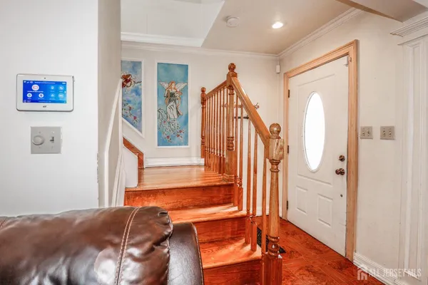 a view of front door and bedroom
