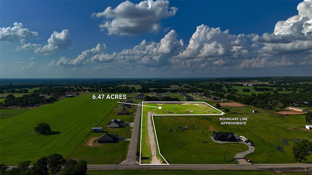 1160 Doss Road Millsap, TX 76066 - Photo 2 of 24 an aerial view of a golf course with a lake view