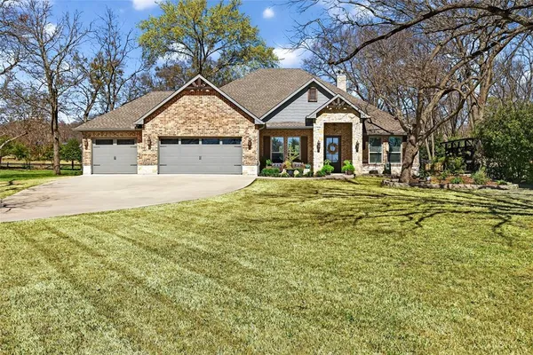 a house with trees in the background