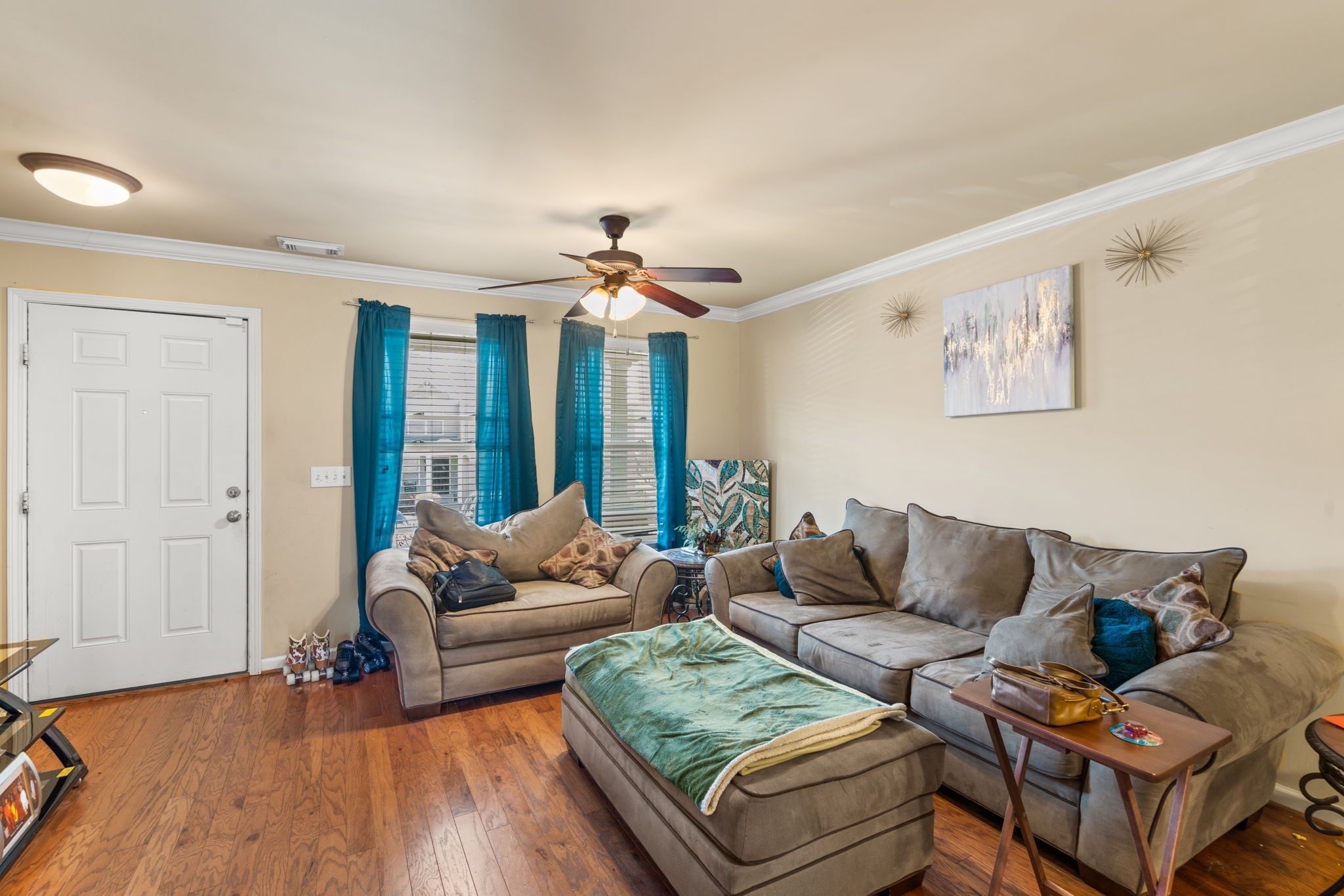 1382 Rural Hill Road, Unit 103 Antioch, TN 37013 - Photo 6 of 15 a living room with furniture and wooden floor