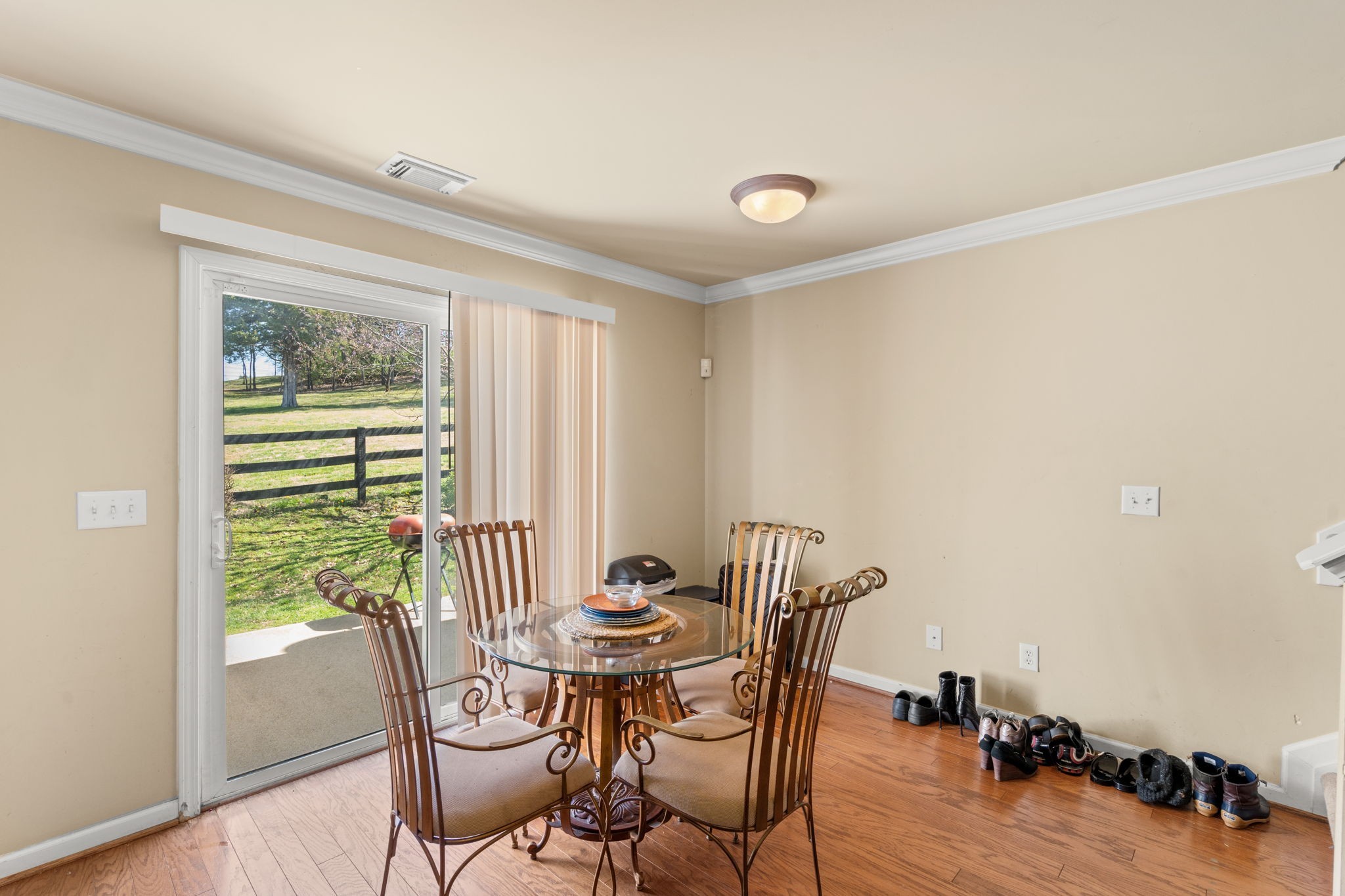 1382 Rural Hill Road, Unit 103 Antioch, TN 37013 - Photo 8 of 15 a view of a dining room with furniture window and wooden floor