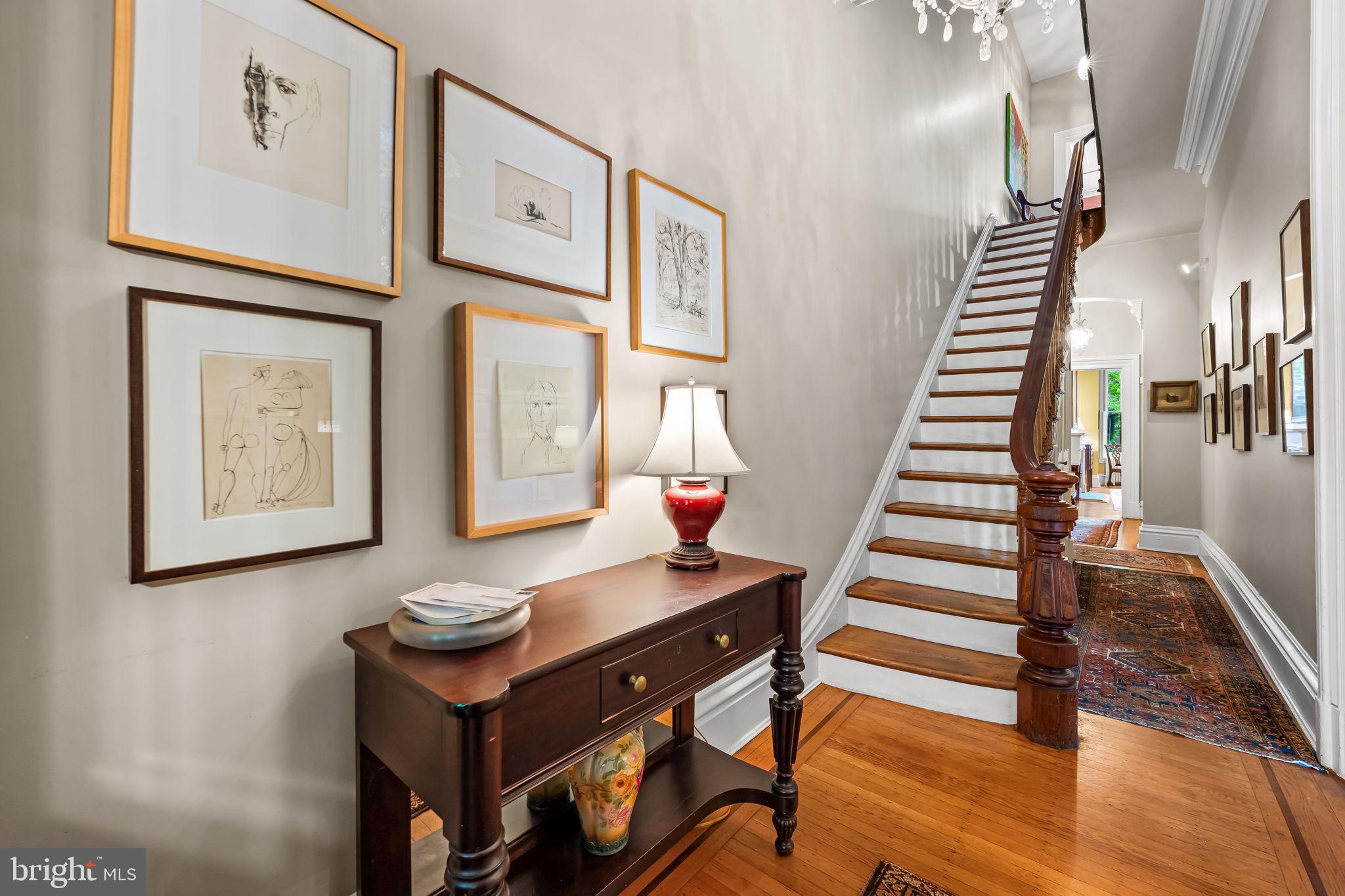 1310 Bolton Street Baltimore, MD 21217 - Photo 12 of 69 a view of a workspace with furniture and stairs