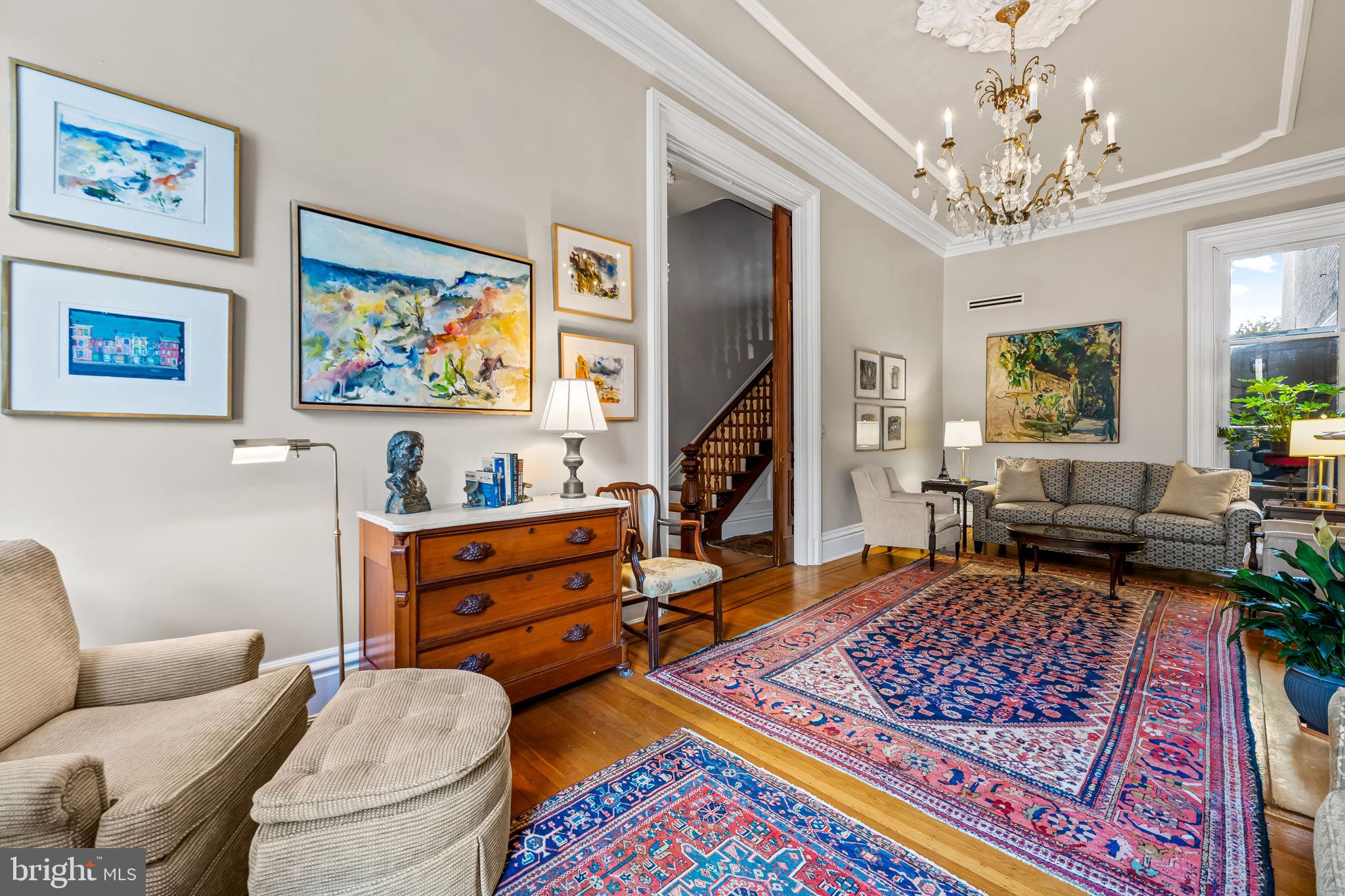 1310 Bolton Street Baltimore, MD 21217 - Photo 17 of 69 a living room with furniture and a rug